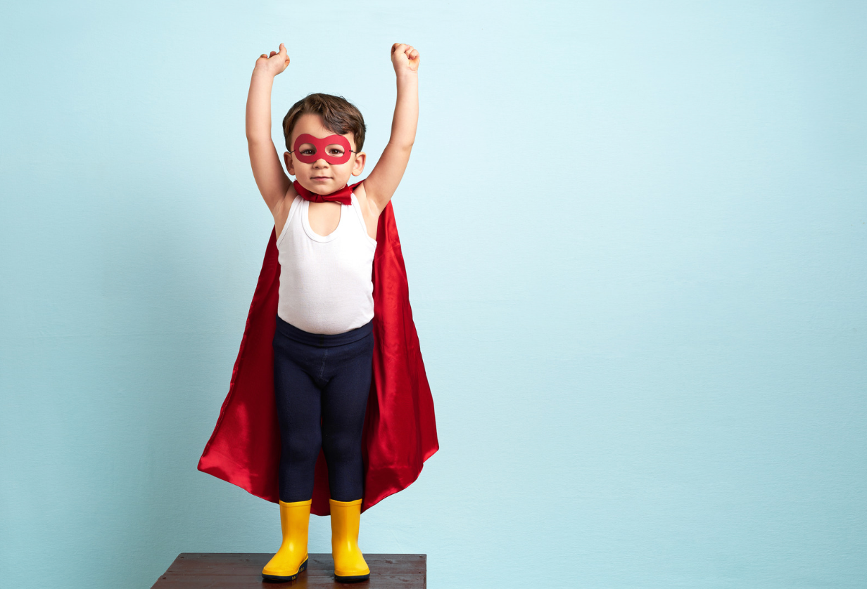 Young child dressed as a superhero