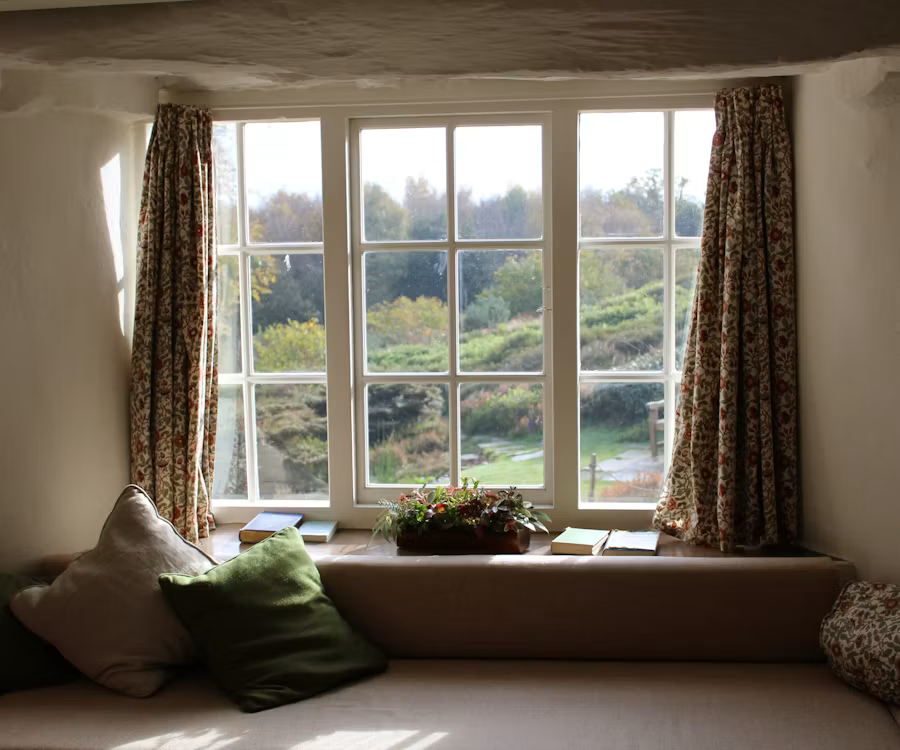 Quiet window seat overlooking a garden